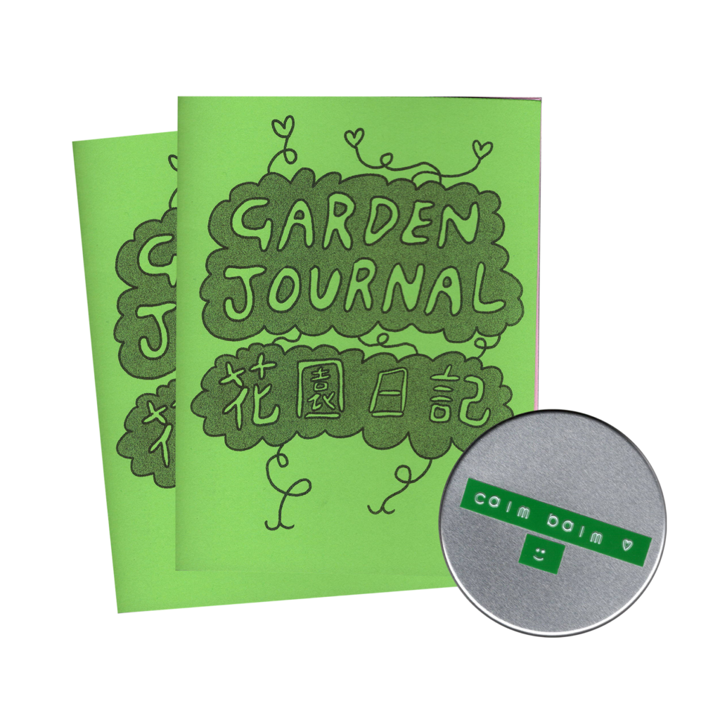 the cover of garden journal zine along with a tin of calm balm. the zines are on bright green paper and dark grey ink showing bubble letters within dark clouds, and there are hearts growing on a vine in the background. The balm is in a round flat silver tin, it has a green sticker label going across that says calm balm with a heart, below is a smiley face.